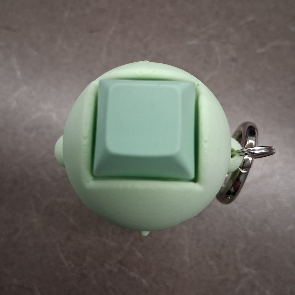 Green Keychain Toy - Picture 2 of 2